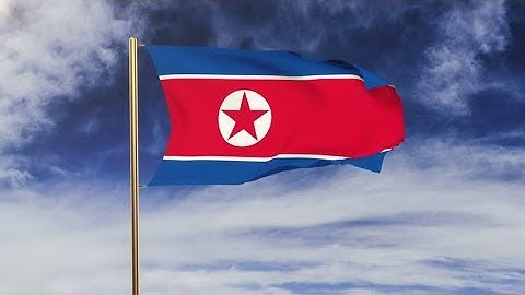 4K North Korea flag with cloud waving in the wind. Green screen, alpha matte. Loopable animation