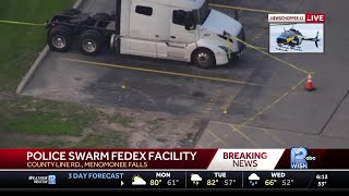 Police swarm FedeEx facility