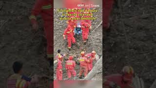 Firefighters trek 8 hours to rescue stranded elderly after landslide