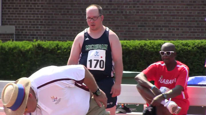 Barney Hinch throws shot put at Special Olympics