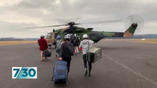 More than 300 people evacuated by air from Mallacoota | 7.30