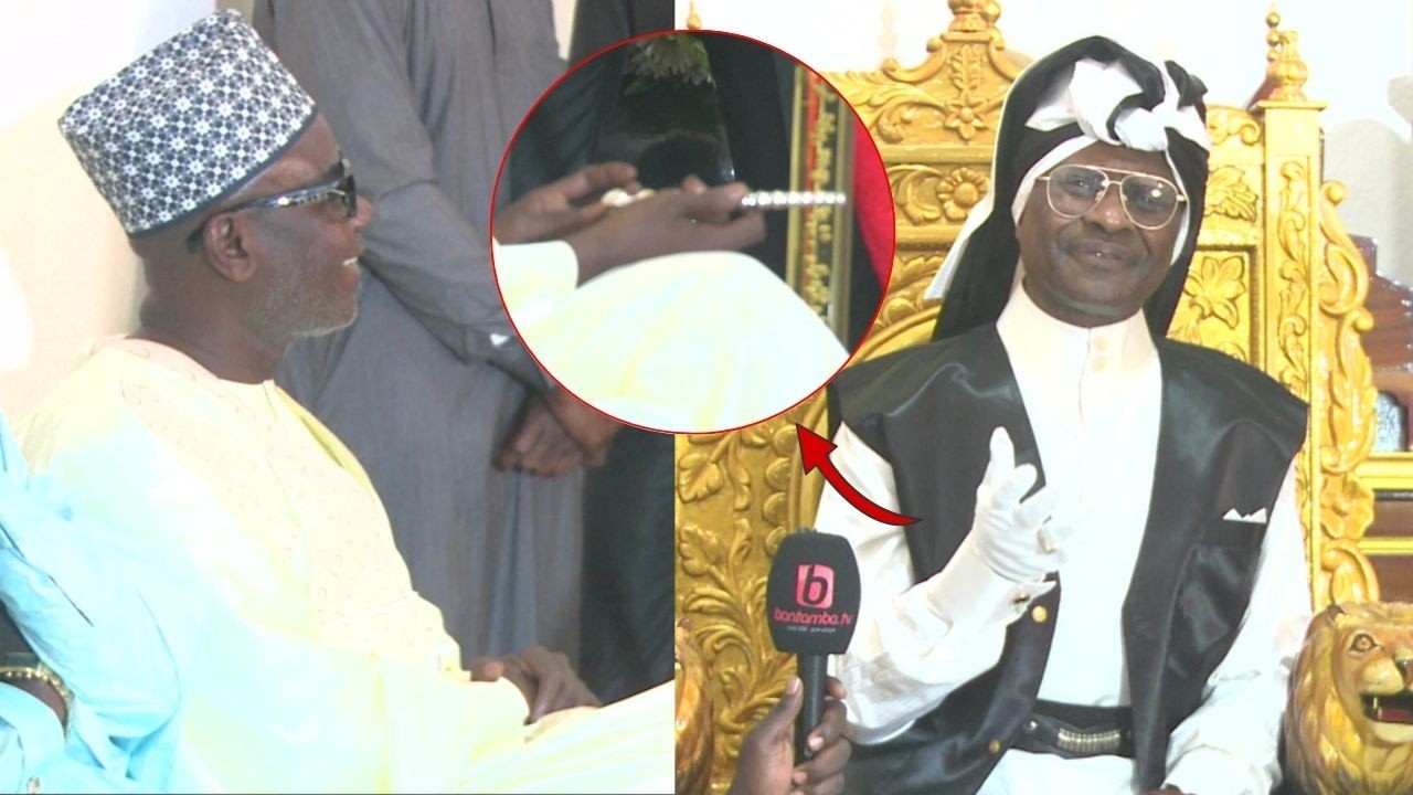 Mashalal Serigne Modou kara offre a Pere Becaye un canne en argent