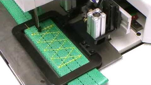 Heavy duty automatic pattern sewing machine for slings and belts