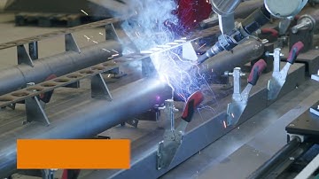 7th axis welding robot in action