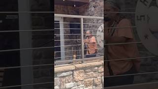 In Gatlinburg Streets, a man with a guitar 🎸 jamming