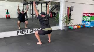 Squat Pulses demonstration