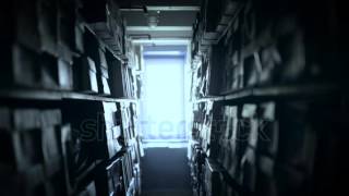 Footage clip of shelves of documents stored in archive