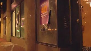 Protesters burn flag, shoot mortars, break windows in Portland