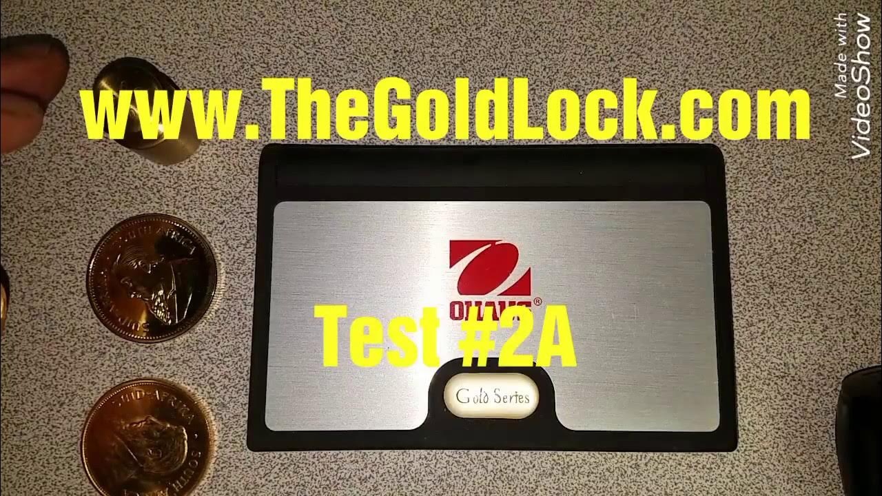 Weighing a fake gold coin Test 2A YouTube