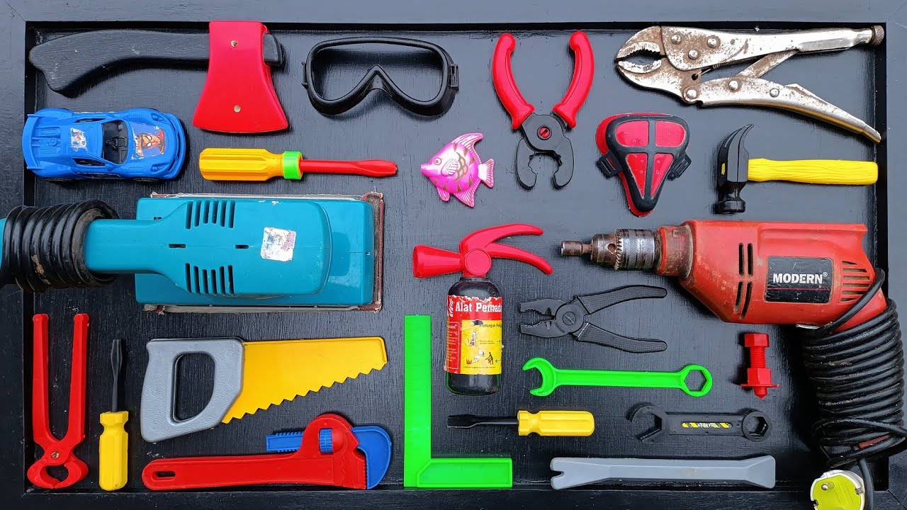 Collection of Repair Tools, Electric Drill, Electric Saw, Hammer With Wriench, Pliers, Hacksaw