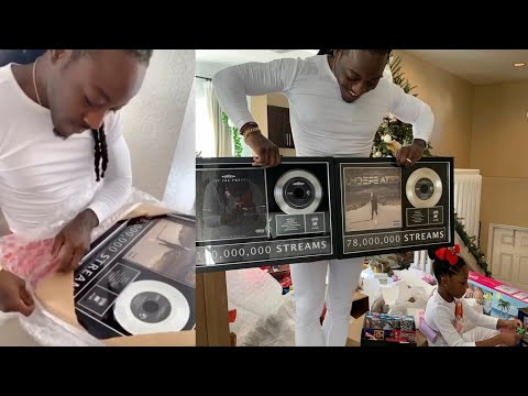 Ace Hood Gets Emotional When His Wife Gets Him Plaques For His Independent Music For Christmas