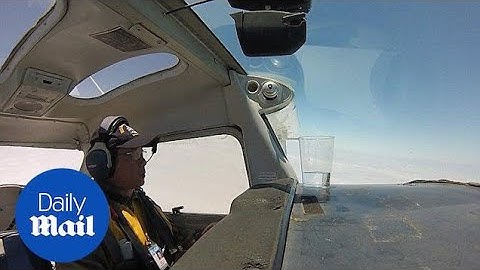 Pilot successfully performs barrel roll without spilling water