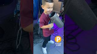 Niño Tocando Güira