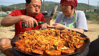 Duck Bulgogi with Udon on a cauldron lid - Mukbang eating show