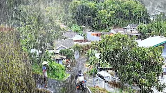 WALKING IN THE RAIN IN A BEAUTIFUL HILLSIDE VILLAGE