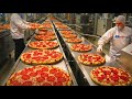 كيف يتم إنتاج ملايين قطع البيتزا داخل المصانع مشاهد مذهلة 