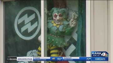 Benton neighbors concerned after man displays Nazi flags in front window