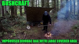 Solo Overnight Bushcraft base camp setup large tarp and improv bivvy bag