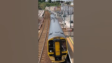 GWR class 158 rattling over colonade viaduct into Dawlish Station-Exmouth service 158750 DMU