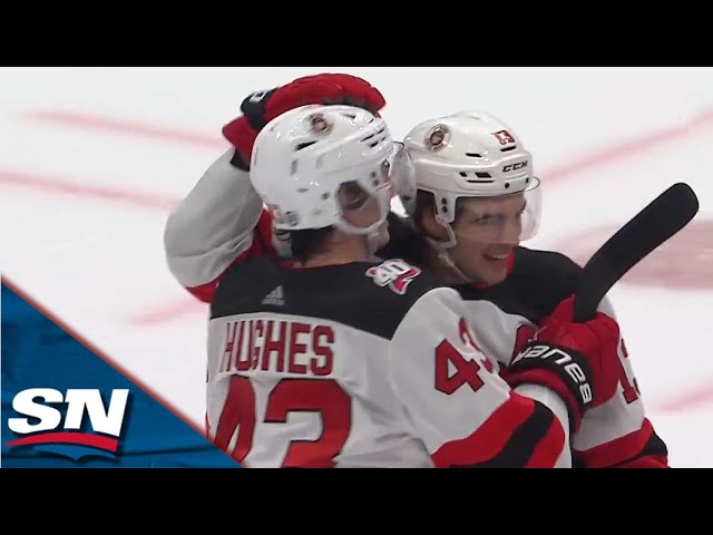 New Jersey Devils defenseman Luke Hughes (43) celebrates after his winning  goal in overtime of an NHL hockey game against the Washington Capitals with  teammates, Thursday, April 13, 2023, in Washington. (AP