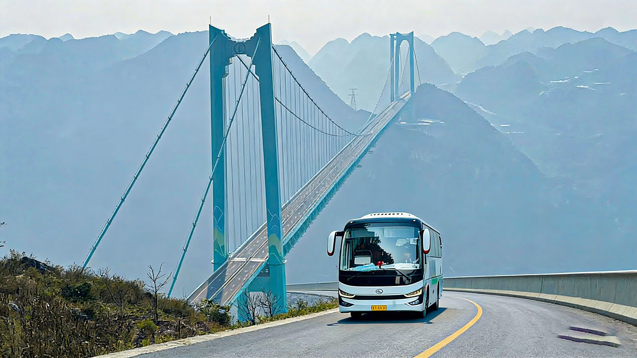 The world's highest bridge: a 4K drive tour of the Huajiang Canyon Bridge in China.
