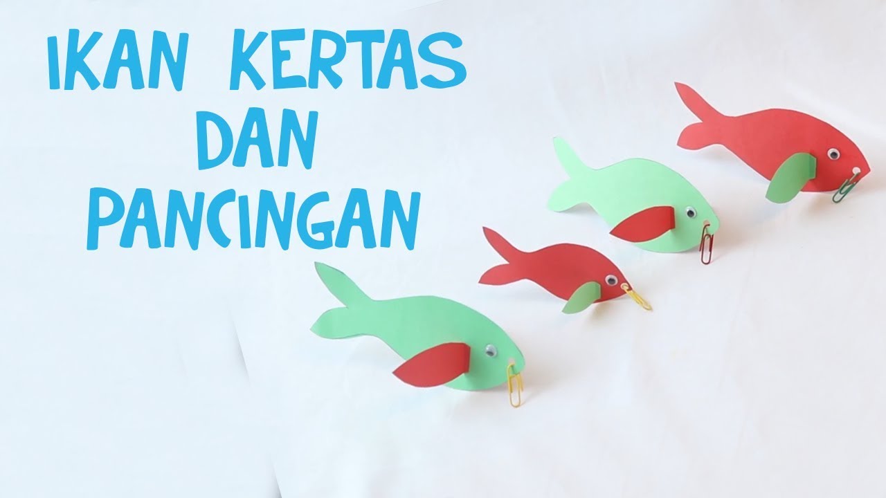 Anak paud TK memancing ikan kertas