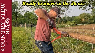 Splicing Pasture fence and Hanging Gates.  Getting the pasture is ready for Steers