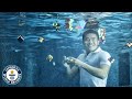 He Solves Cubes Underwater, Whilst Juggling And... - Guinness World Records