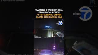 Sleeping driver slams into patrol car, narrowly missing cop: Police