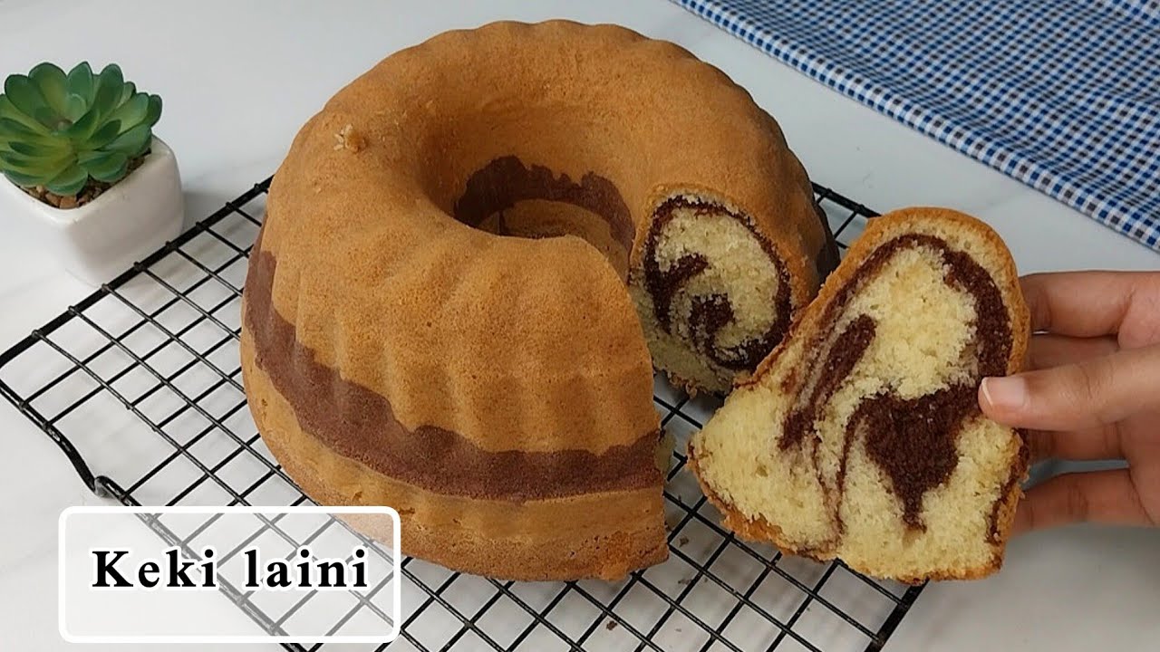 Jinsi ya kutengeneza keki ya kuchambuka na laini sana | Marble cake recipe