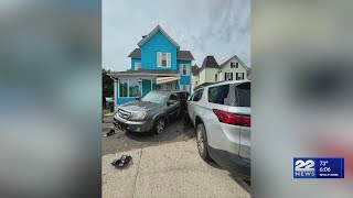 House damaged in two-vehicle crash on Allen Street in Springfield