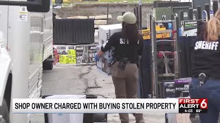 Omaha store raided, owner charged with buying, selling stolen property