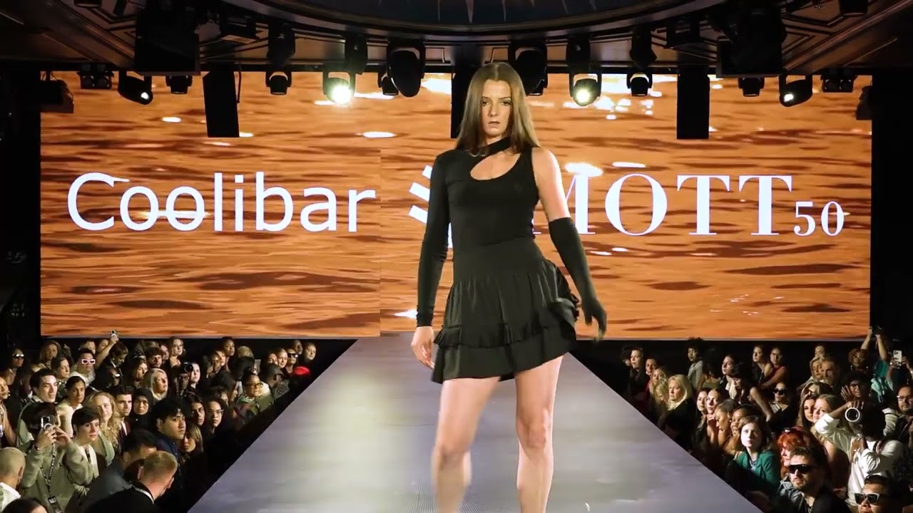 Edgy Elegance Meets Sun Protection: Eden CutOut Top, Charlotte Bay Ruffle Skirt & Sun Gloves at NYFW