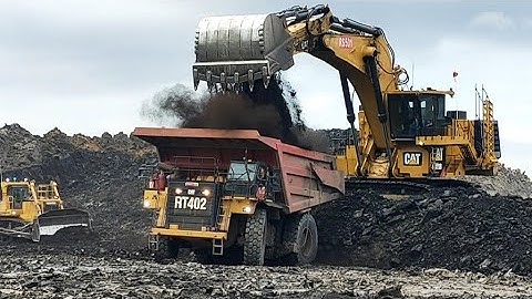 Cat 6020B Loading Coal on Truck Cat 777E -hydraulic mining shovels