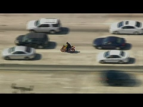 Police chase in Los Angeles: Biker reaches 106mph as he weaves through traffic inches from vehicles