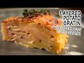 Fall in love again with these layers of Potato Gratin with Smoked Ham and Cheese