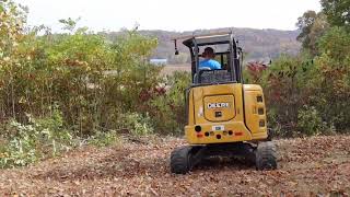 Rut Brush Eliminator and cab protection for JD35G cliff job | CBH