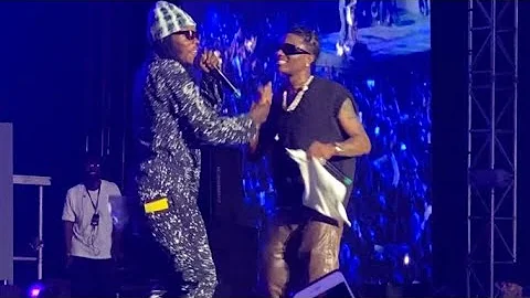 Naira Marley Suprises Wizkid On Stage And Steals The Show With An Electrifying Live Performance.