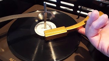 RCA 3 speed automatic record player playing a 78 RPM record.