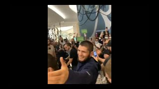 Khabib Nurmagomedov celebrating after the fight