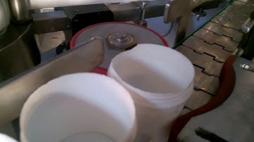 Wrap round bottle self adhesive labeling machine , Label applicator