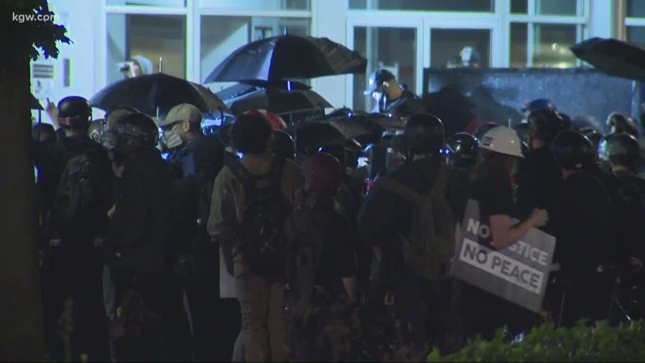 Portland Riot Police Precinct Protesters gather outside Portland police North Precinct - YouTube