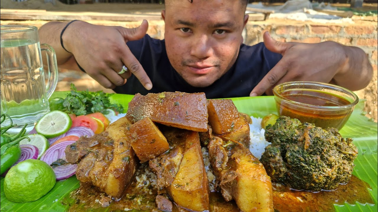 EATING LOCAL PORK GRAVY WITH RICE 