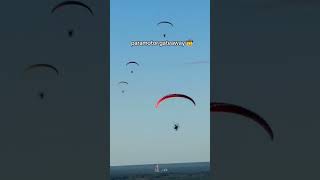 Soaring Above The Clouds And Taking In The Views. Experience The Beauty Of Paramotoring