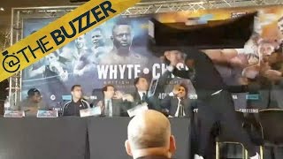 Pro boxer Dereck Chisora throws table at opponent at press conference TheBuzzer 