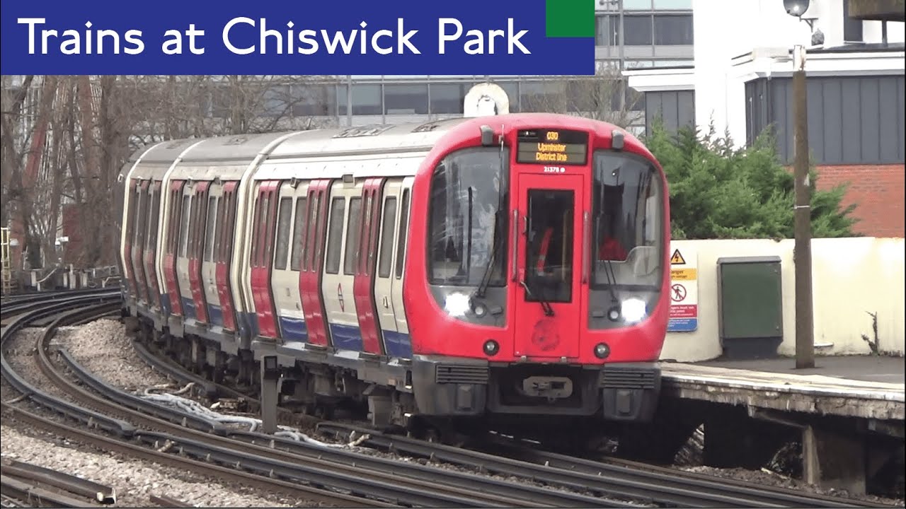London Underground Piccadilly And District Line Trains At Chiswick Park