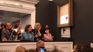 Banksy - Shredding his artwork at Sotheby&#39;s live auction on October 5th 2018 (October 5, 2018)