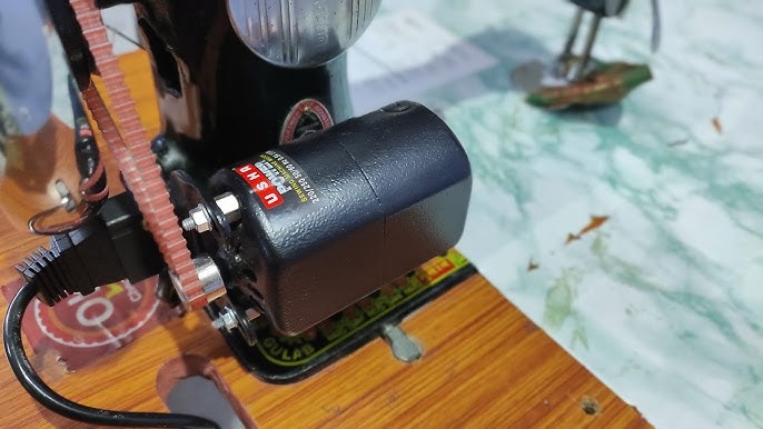 How to attach an electric motor to a manual sewing machine 