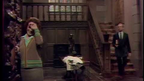 Grayson Hall/Julia Hoffman giggles in Dark Shadows.