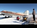 DC-3 landing on skis at Chelatna Lake.   Alaska Bush Air Cargo
